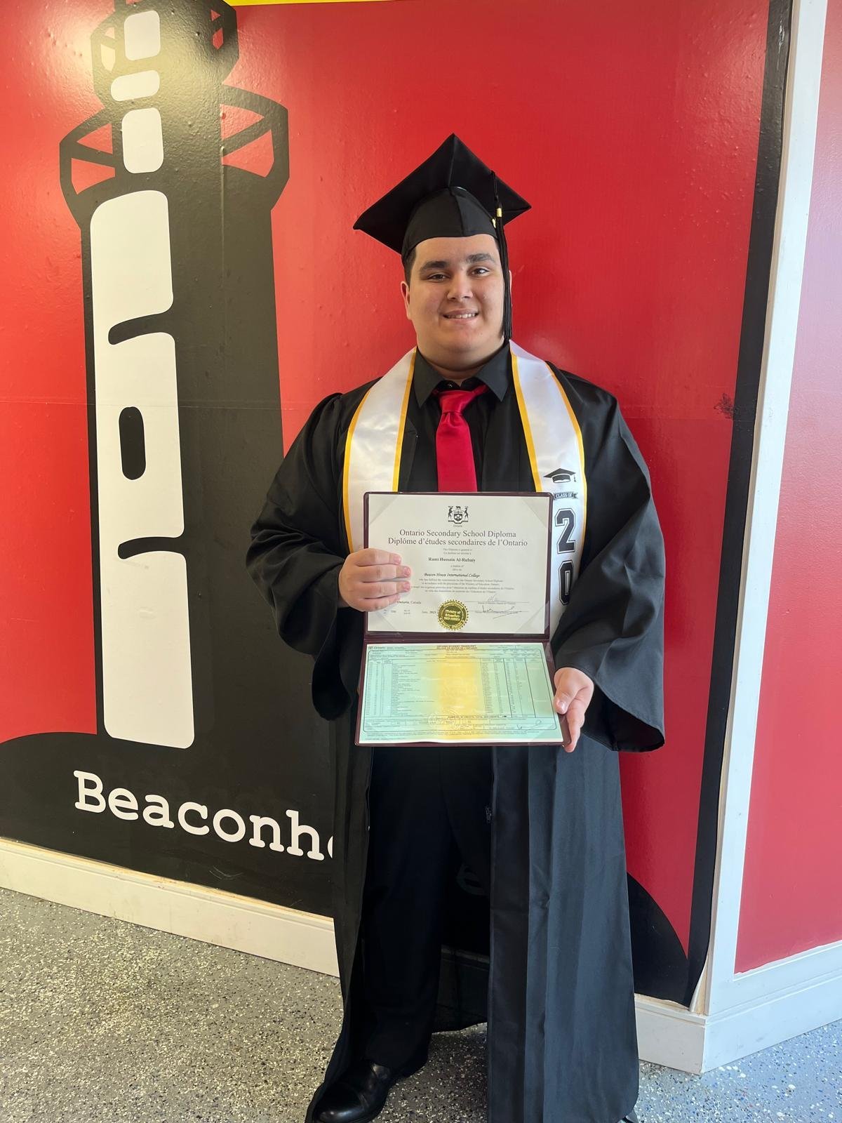Beaconhouse graduate with certificate — photograph 3