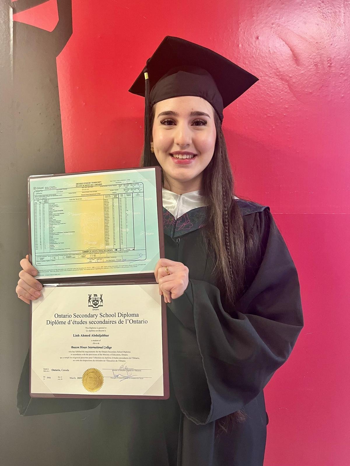 Beaconhouse graduate with certificate — photograph 1